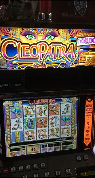 Bally Casino slot reels spinning on an iPhone screen